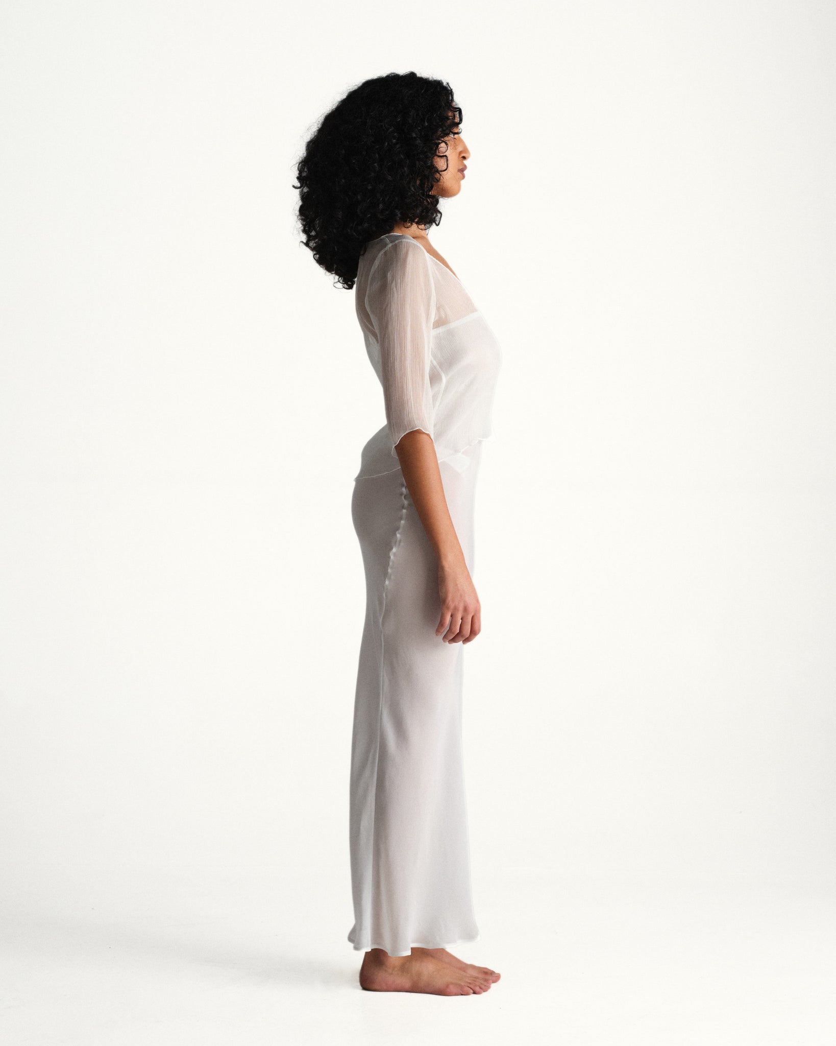 feather half sleeve top - white