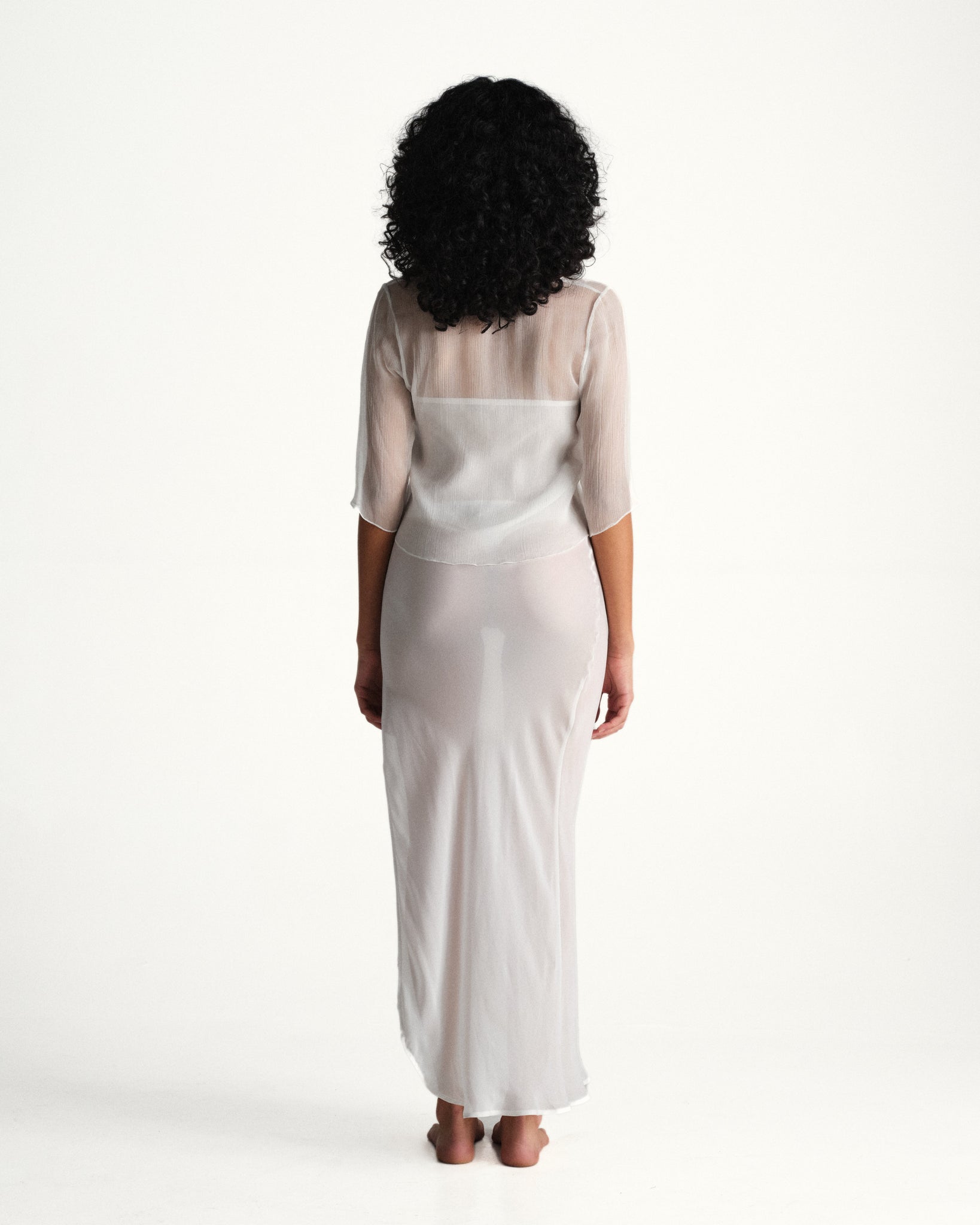 feather half sleeve top - white