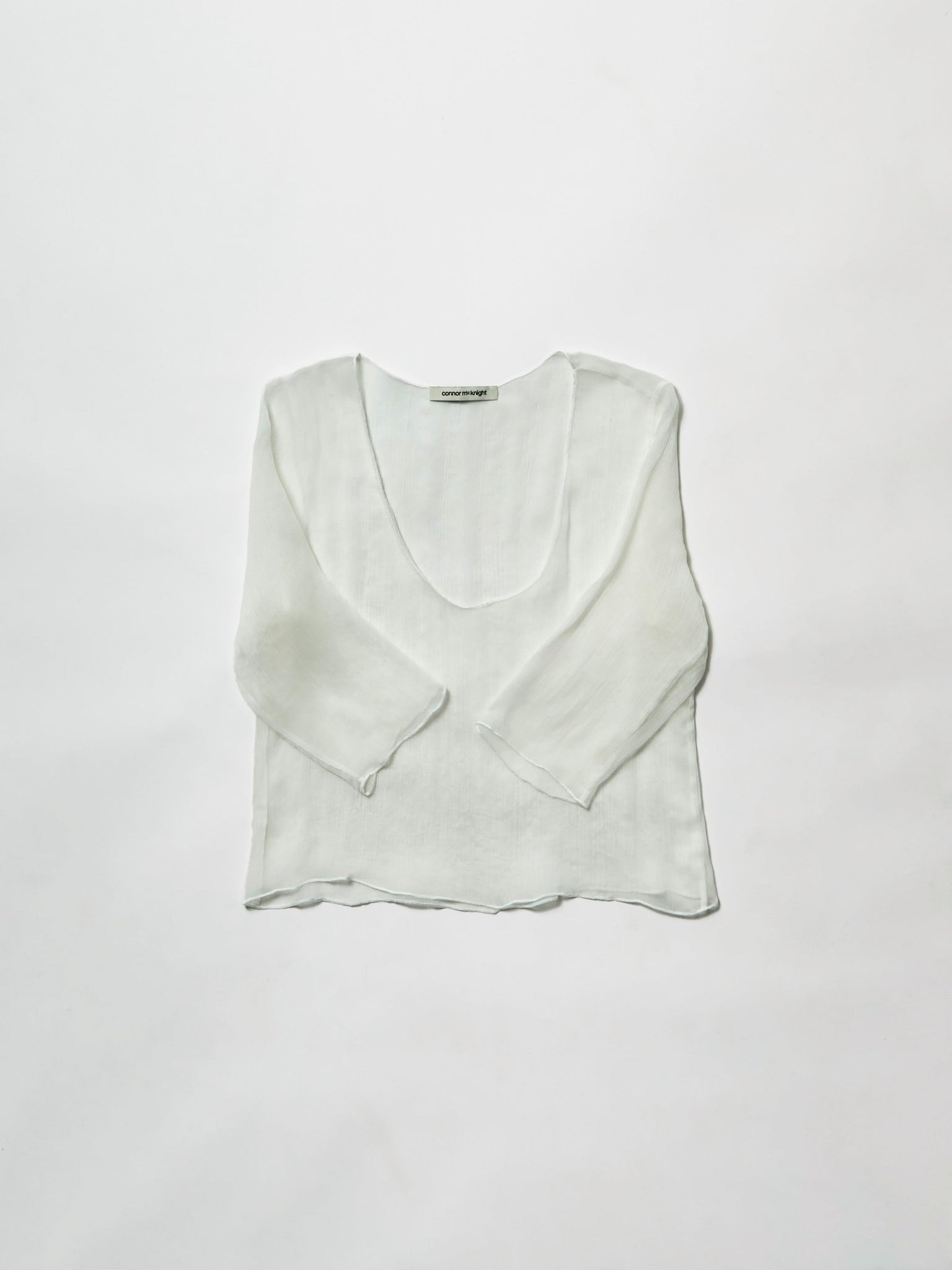 feather half sleeve top - white